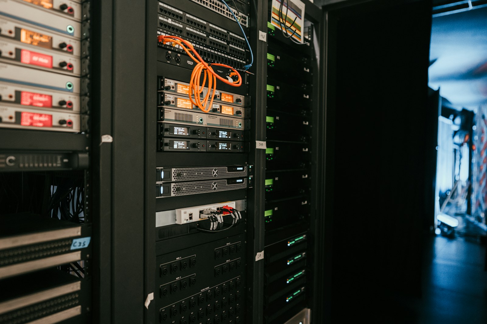 Networking server rack with patch cables in a server room